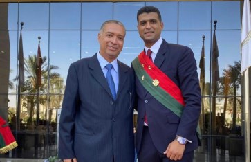 المستشار مجدى السيد صالح ونجله محمد وكيل النائب العام